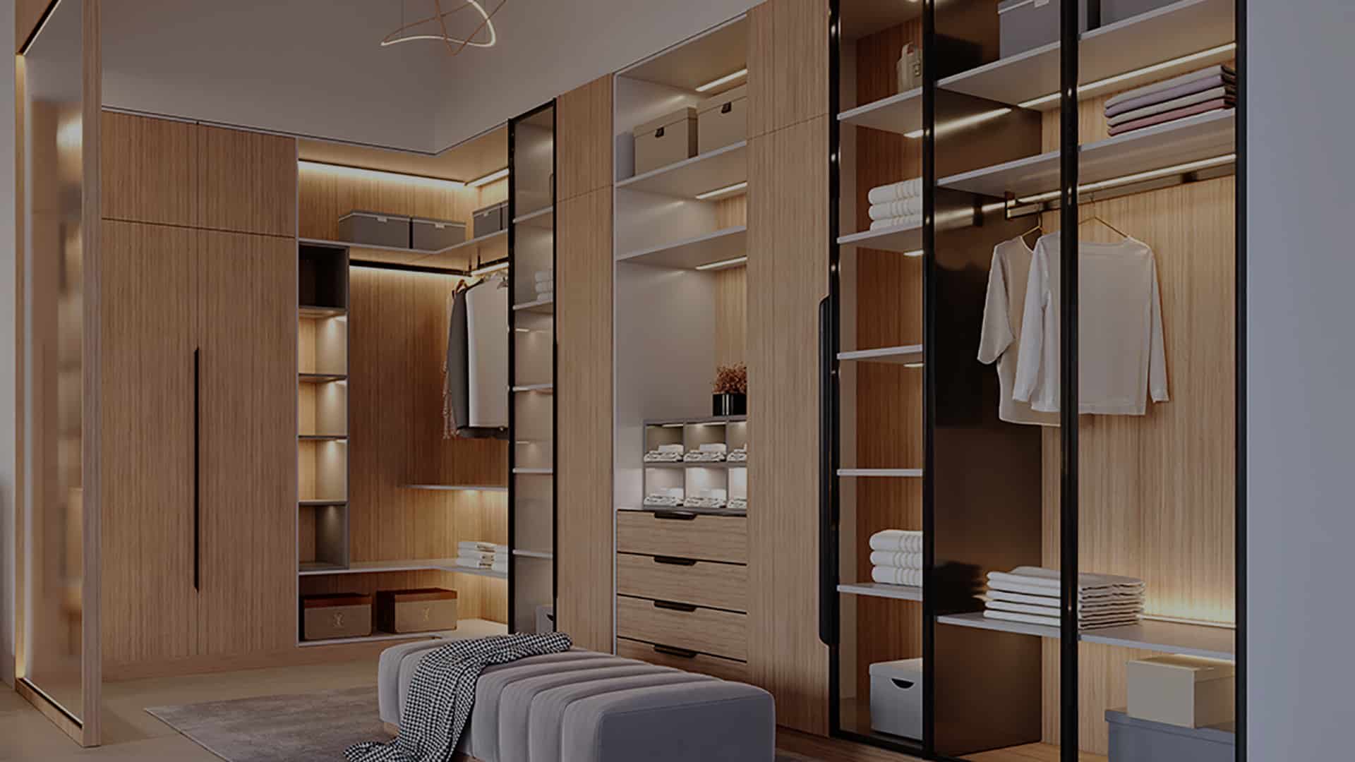 Oak walk-in closet with glass doors, open shelving and an upholstered bench